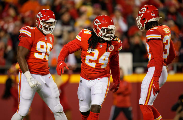 Dec 5, 2021; Kansas City, Missouri, USA; Kansas City Chiefs linebacker Melvin Ingram III (24) celebrates with defensive tackle Chris Jones (95) and cornerback L'Jarius Sneed (38) after a play against the Denver Broncos during the first half at GEHA Field at Arrowhead Stadium. Mandatory Credit: Jay Biggerstaff-USA TODAY Sports